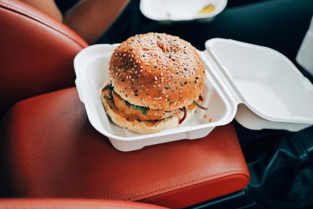 Burger in a car.