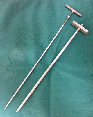 The liver biopsy needle and trochar.