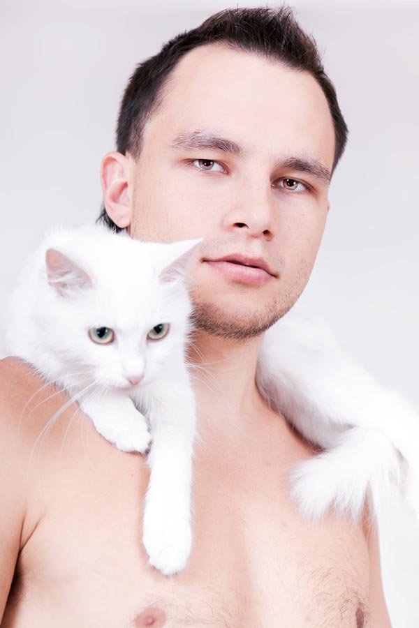 "Phwoar, never mind the cat, I wouldn’t mind giving him a clinical exam!”. Just, no. Image © 2happy / Fotolia.