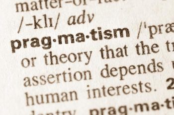 Pragmatism (prægmətɪzəm ) – the quality of dealing with a problem in a sensible way that suits the conditions that really exist, rather than following fixed theories, ideas, or rules (Source: Cambridge Dictionary). Image © aga7ta / Adobe Stock.