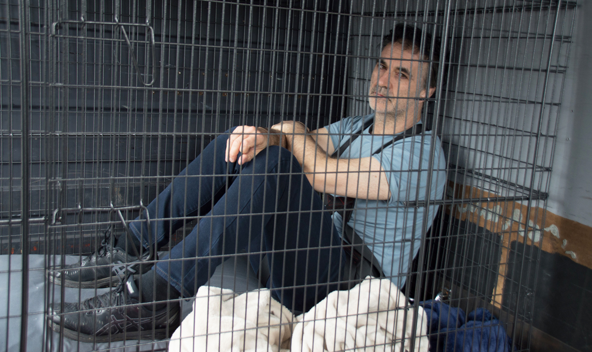 Noel Fitzpatrick in a cage.