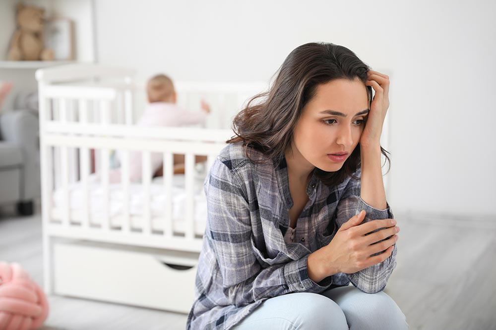 Postnatal depression. Image © Pixel-Shot / Adobe Stock